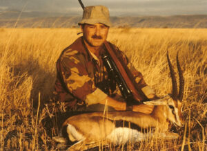 Bob Kern, the world's lead hunting consultant, posing with a wild african animal he just harvested