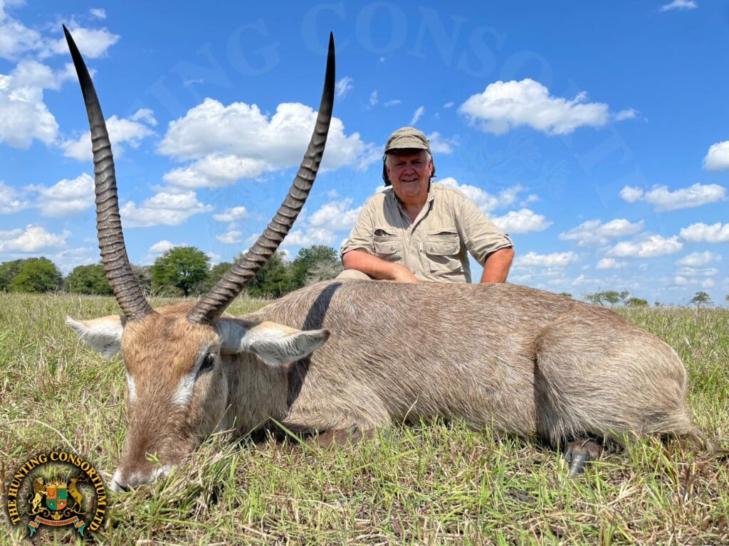 Photo of our client with his Common Waterbuck Hunting in Mozambique. Waterbuck Hunts in Africa