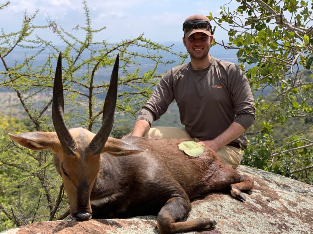 Photo of our client with his East African Bushbuck Hunting in Tanzania. Bushbuck hunts in Tanzania.