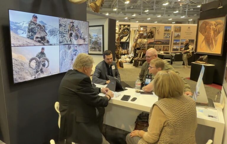 The Hunting Consortium's team of international hunting brokers at the Safari Club International 2026 Expo. Rob Kern with clients